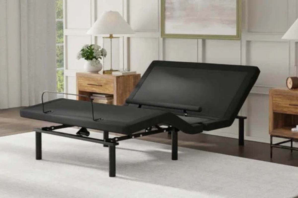 Adjustable bed base in a modern bedroom setting, showcasing customizable sleep position features for enhanced comfort and relaxation.
